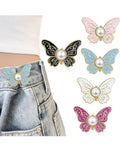 Butterfly pearl button clip in black and white variants
