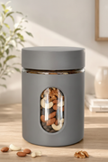Glass window canister filled with mixed dry fruits